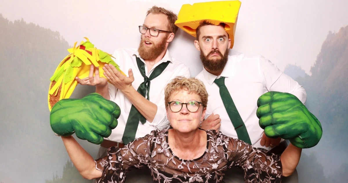 Luxury Wedding Photo Booth Rental in Loveland, CO - Mother of the groom, Groom and best Man pose together in the photo booth