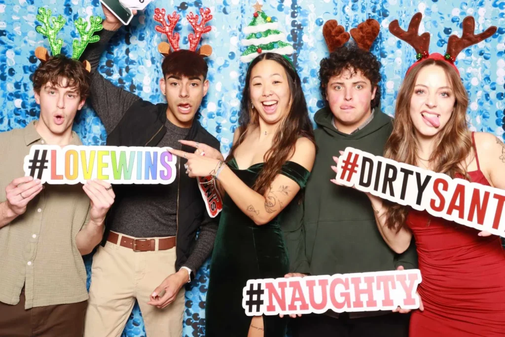 Holiday Photo Booth Rental | Employee appreciation winter social hosted by Dutch Bros for their employees at Windsong Estates Event Center in Fort Collins, CO