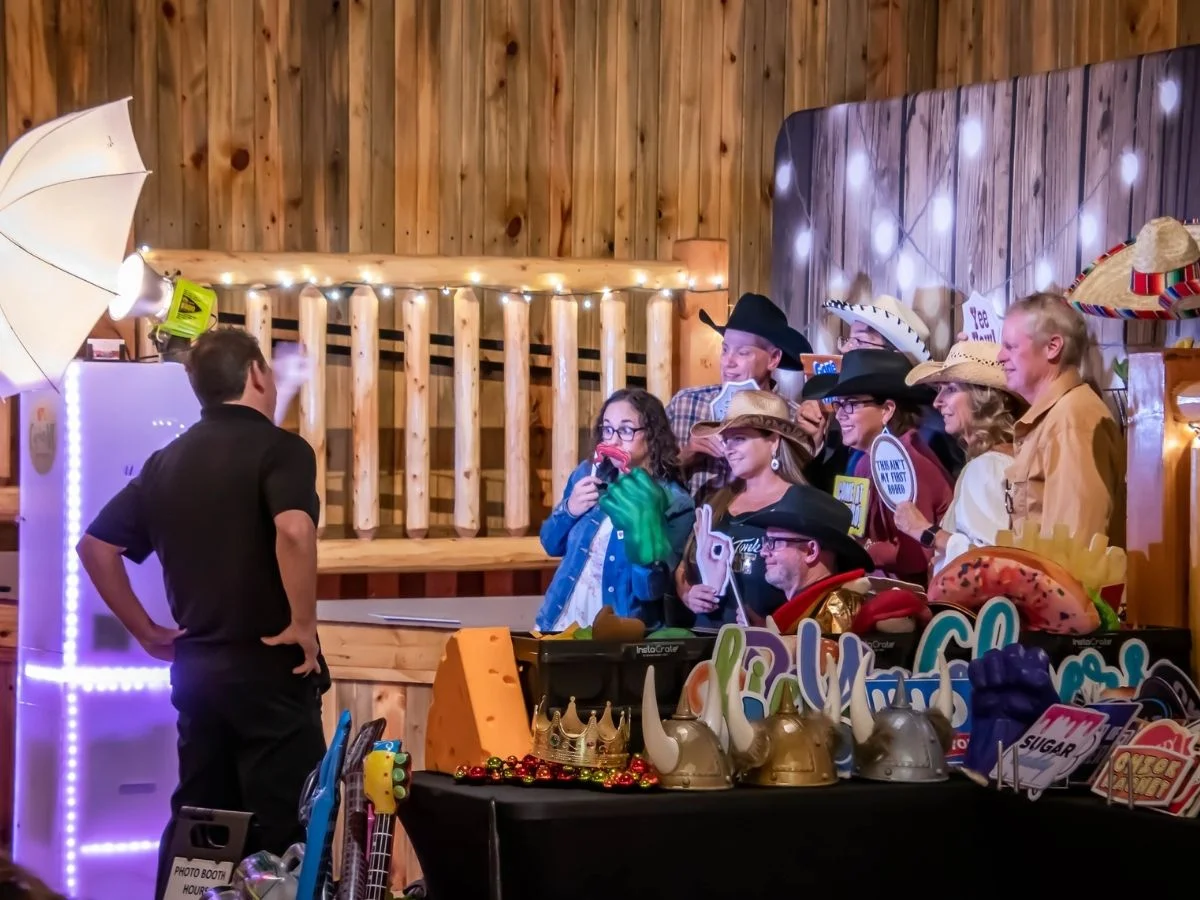 Premium Photo Booth Setup with props and backdrop | CaptureME Photo Booth Rental Company in Windsor, CO | Weddings and Corporate Events in Northern Colorado