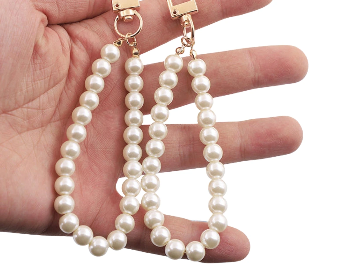 Keychain photo booth favors with faux leather straps at a Windsor event