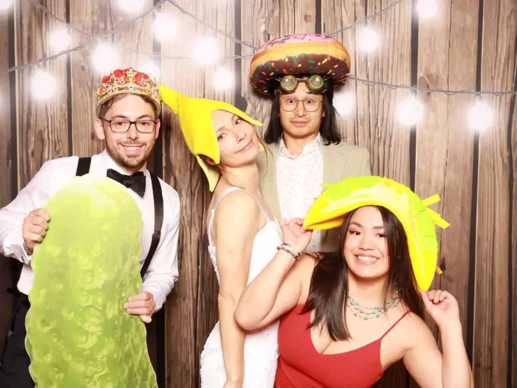 Photo booth guest photo with props from Brookside Gardens wedding in Berthoud Colorado