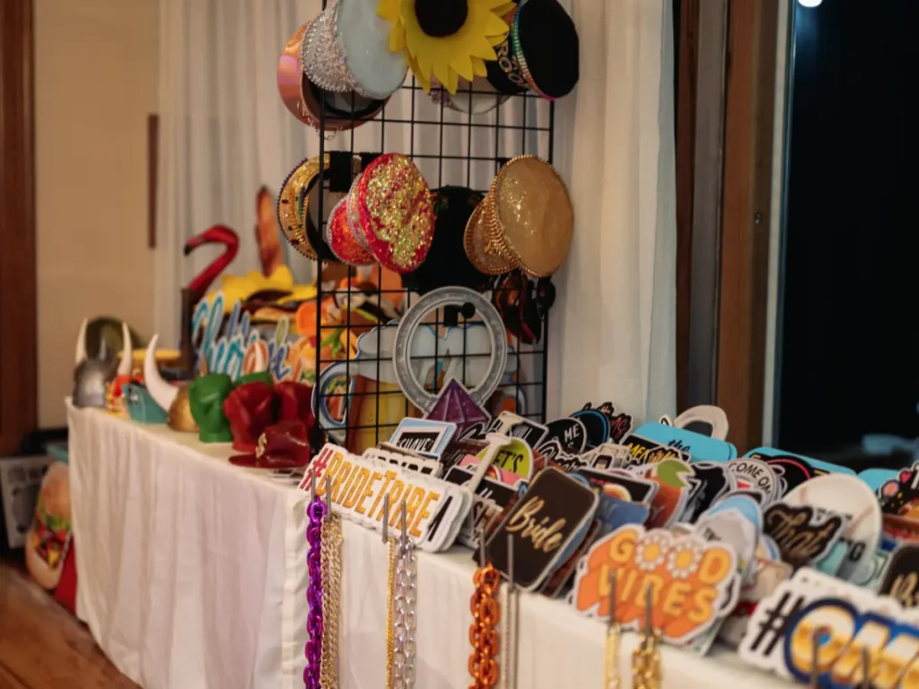 Premium photo booth prop setup at Brookside Gardens wedding in Berthoud Colorado