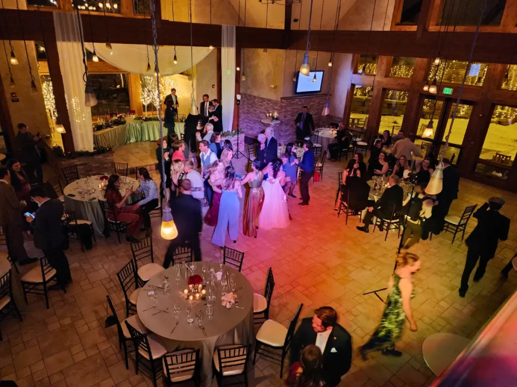 Wedding guests dancing at Della Terra Mountain Chateau reception in Estes Park Colorado